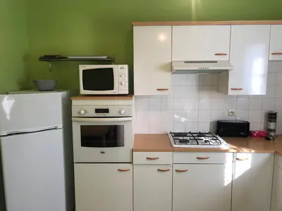 Cuisine ou kitchenette dans l'établissement pavillon individuel
