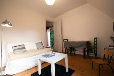 Coin salon dans l'établissement Gîte Les Ecuries du Manoir de Bénédicte