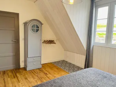 Un ou plusieurs lits dans un hébergement de l'établissement Appartement cosy bord de mer