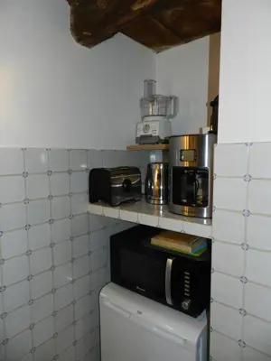 Cuisine ou kitchenette dans l'établissement Domaine du Manoir de Vains
