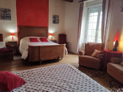 Un ou plusieurs lits dans un hébergement de l'établissement Le haut Manoir