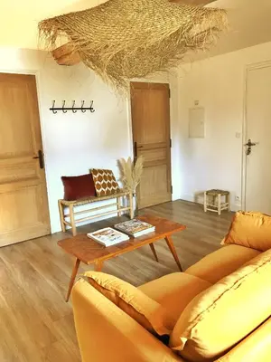 Coin salon dans l'établissement Le Domaine de l'Hostellerie