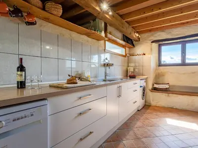 Cuisine ou kitchenette dans l'établissement Holiday Home La Bergerie by Interhome