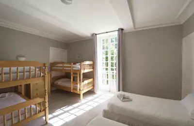 Un ou plusieurs lits dans un hébergement de l'établissement Château Baffy