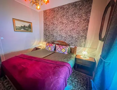 Un ou plusieurs lits dans un hébergement de l'établissement Maison confortable plages du Débarquement en Normandie