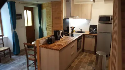 Cuisine ou kitchenette dans l'établissement Le Marite