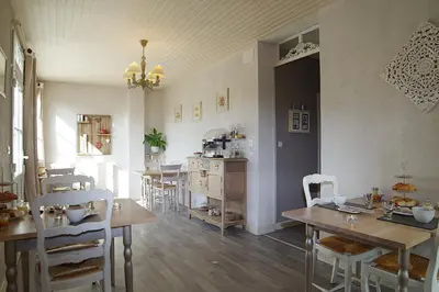 Coin salon dans l'établissement Les 4 saisons