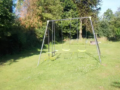 Jardin de l'établissement Maison charmante à Sourdeval avec jardin clôturé