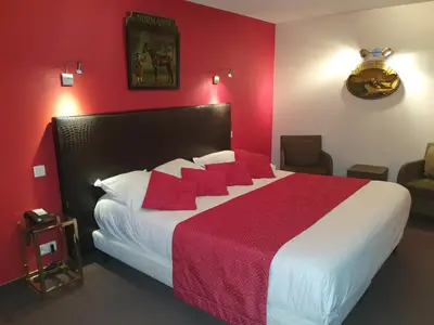 Un ou plusieurs lits dans un hébergement de l'établissement Hôtel de La Croix d'Or