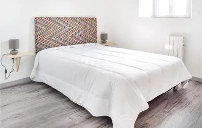 Un ou plusieurs lits dans un hébergement de l'établissement 3 Bedroom Stunning Home In Sainteny
