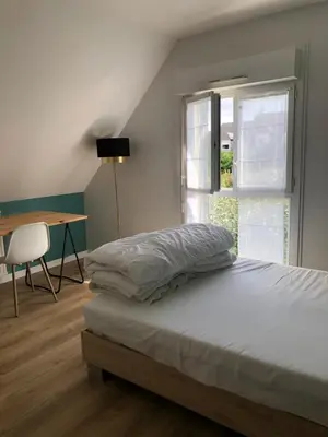 Un ou plusieurs lits dans un hébergement de l'établissement maison 400 m de la plage