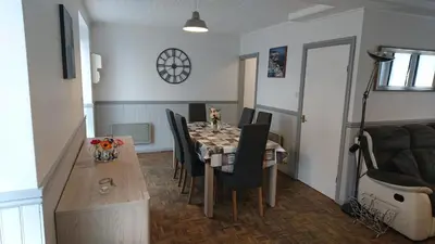 Coin salon dans l'établissement Gîte chez Lili