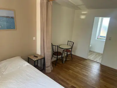 Un ou plusieurs lits dans un hébergement de l'établissement CHAMBRES / BEDROOM