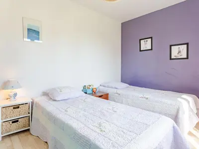 Un ou plusieurs lits dans un hébergement de l'établissement Holiday Home Colibri by Interhome