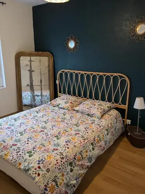 Un ou plusieurs lits dans un hébergement de l'établissement Maison de vacances cosy