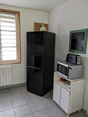 Cuisine ou kitchenette dans l'établissement Maison de vacances cosy