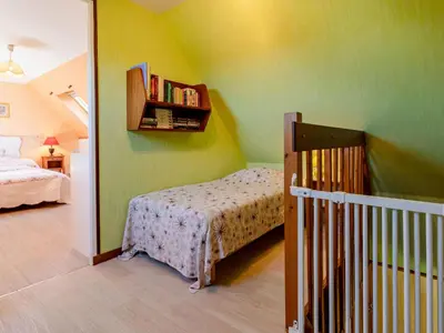 Un ou plusieurs lits dans un hébergement de l'établissement Holiday Home Chez Laurette by Interhome