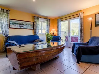 Coin salon dans l'établissement Holiday Home Chez Laurette by Interhome