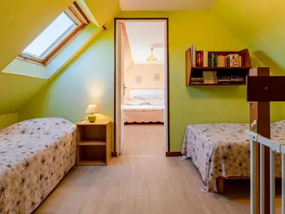 Un ou plusieurs lits dans un hébergement de l'établissement Holiday Home Chez Laurette by Interhome