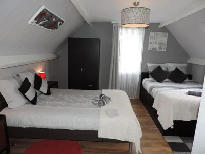 Un ou plusieurs lits dans un hébergement de l'établissement Chambres d'Hotes La Maison Neuve
