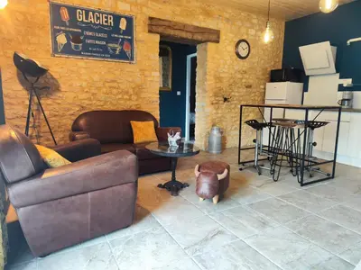 Coin salon dans l'établissement La ferme aux chats