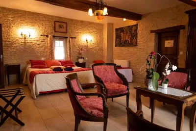 Coin salon dans l'établissement Le Clos des Courtines - Meuvaines