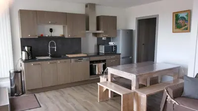 Cuisine ou kitchenette dans l'établissement Appartement vue sur mer et port