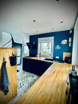 Télévision ou salle de divertissement dans l'établissement Gîte « La Vague » 8-10 pers