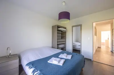 Un ou plusieurs lits dans un hébergement de l'établissement Les Vignets comfortable holiday home