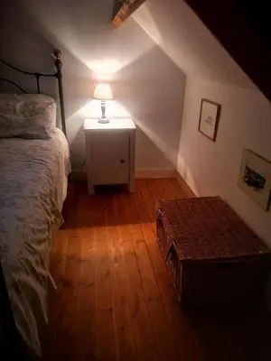 Un ou plusieurs lits dans un hébergement de l'établissement Chambres d'Hôtes Ferme de la Baie