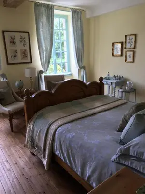 Un ou plusieurs lits dans un hébergement de l'établissement Chambres d'Hôtes Belle Vallee