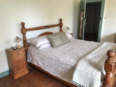 Un ou plusieurs lits dans un hébergement de l'établissement Chambres d'Hôtes Belle Vallee
