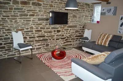 Coin salon dans l'établissement Gîte de L'Hotel Mahey