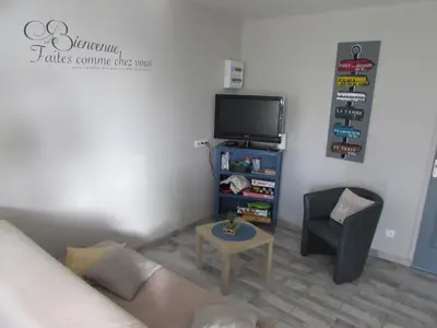 Télévision ou salle de divertissement dans l'établissement Gîte de la Grenouille
