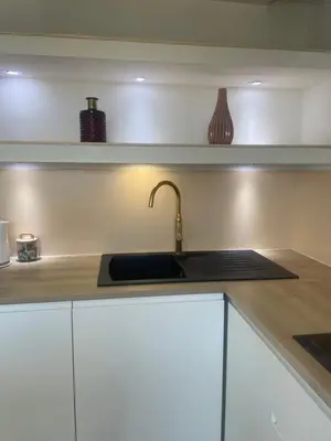 Cuisine ou kitchenette dans l'établissement Les sapins verts -inspiration deluxe