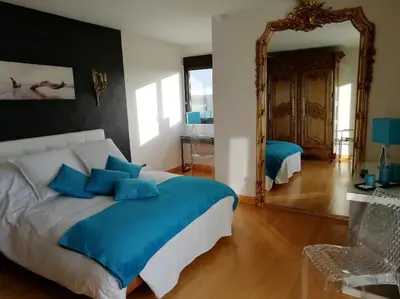 Un ou plusieurs lits dans un hébergement de l'établissement Les Balcons de Saint Pair