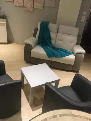 Coin salon dans l'établissement Les Balcons de Saint Pair