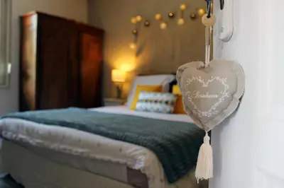 Un ou plusieurs lits dans un hébergement de l'établissement Le Val Daninière B&B Adult only