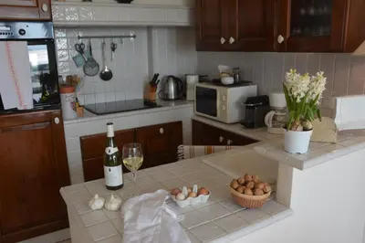 Cuisine ou kitchenette dans l'établissement Gîte La Bertichère