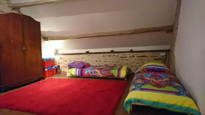 Un ou plusieurs lits dans un hébergement de l'établissement Tricolore Normandie