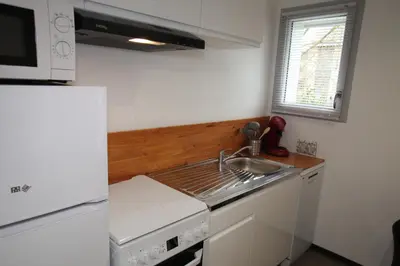 Cuisine ou kitchenette dans l'établissement Résidence Beauvoir le Mont-Saint-Michel