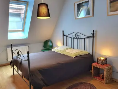 Un ou plusieurs lits dans un hébergement de l'établissement Appartement 2 pièces avec piscine et parking privé, proche plage, Merville-Franceville-Plage - FR-1-465-26
