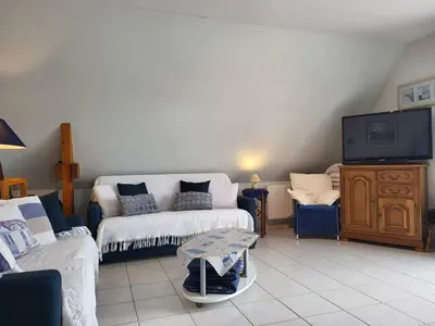 Un ou plusieurs lits dans un hébergement de l'établissement Appartement 2 pièces avec piscine et parking privé, proche plage, Merville-Franceville-Plage - FR-1-465-26