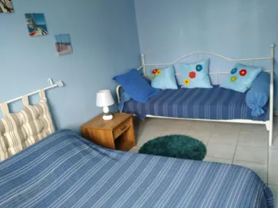 Un ou plusieurs lits dans un hébergement de l'établissement Gîte Le Clos des Pins