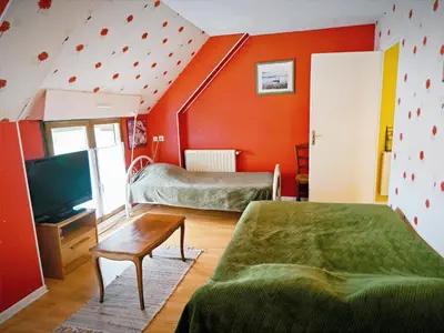 Un ou plusieurs lits dans un hébergement de l'établissement Chambres Les Salles
