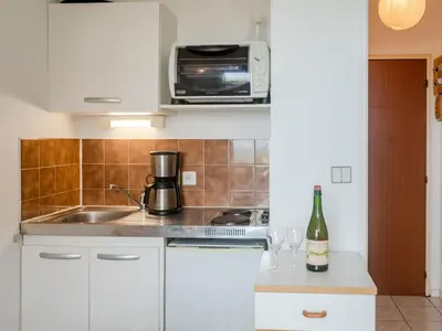 Cuisine ou kitchenette dans l'établissement Apartment Les Normandières-11 by Interhome