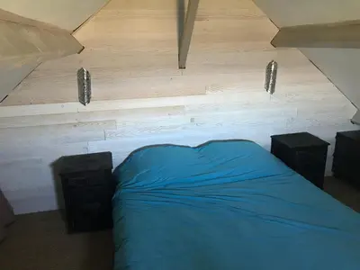 Un ou plusieurs lits dans un hébergement de l'établissement Accès direct mer. Plage du Débarquement