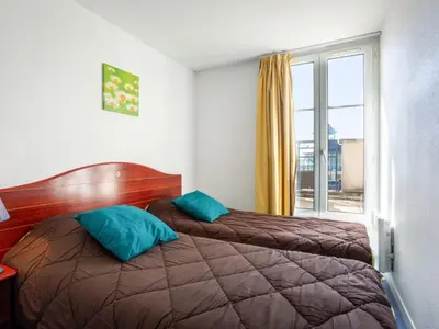 Un ou plusieurs lits dans un hébergement de l'établissement Apartment Port Guillaume-6 by Interhome