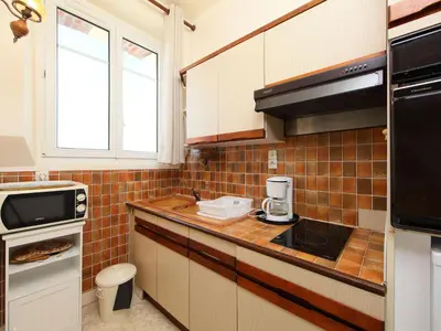 Cuisine ou kitchenette dans l'établissement Apartment Le Caneton-3 by Interhome