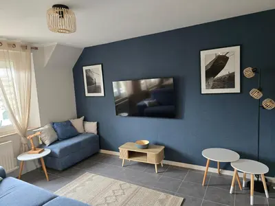 Télévision ou salle de divertissement dans l'établissement Port de La Houle - Beau 3 pièces classé 3 étoiles avec garage privé
